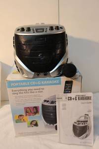 lot 57 image: Portable CD PlayerKaraoke Machine in Original Box