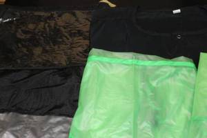 lot 60 image: Cosmetology Aprons and Barber jacket with Hair Poncho See Photos