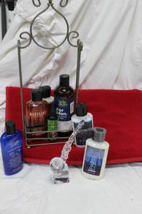 lot 186 image: Mens body care items, bath mat and shower caddy. Harrahs New Orleans Grand Opening Commemorative Crystal Saxophone October 1999