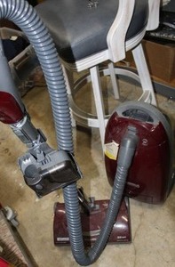 lot 195 image: Kenmore 12Amp Canister Vacuum with attachments and washable Hepa filter