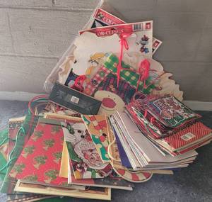 lot 57 image: LOT OF CHRISTMAS GIFT BAGS AS SHOWN.