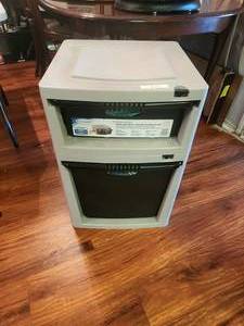 lot 232 image: Suncast stackable storage with contents