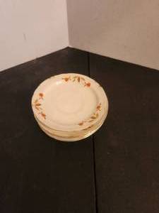 lot 155 image: Halls Superior Quality Kitchenware - Jewel Tea Autumn Leaf - 7-saucers - by Mary Dunbar