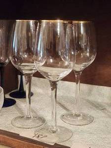 lot 188 image: Set of 3 wine glasses with gold trim