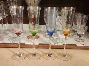 lot 193 image: Set of 4 clear stemmed champagne glasses