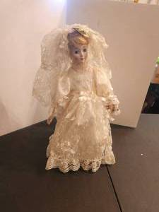 lot 267 image: Porcelain Doll with stand