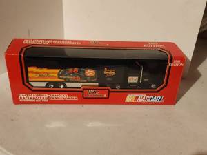 lot 327 image: 164 Texaco - Davey Allison - racing team transporter