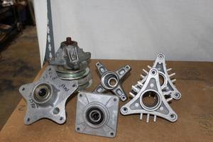 lot 24 image: Lawnmower Deck Spindles as shown in photos
