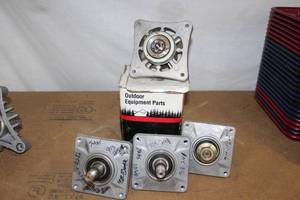 lot 25 image: Lawnmower Deck Spindles as shown in photos