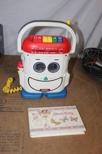 lot 74 image: Vintage Playschool Radio Cassette Player with Mic, and Grandma Photobook