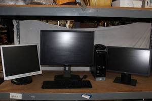 lot 105 image: HP Pavilion Computer Tower and 3 Monitors along with a Keyboard