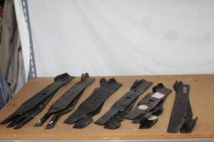 lot 107 image: Generous Amount of Lawnmower Blades ... See Photos for lengths