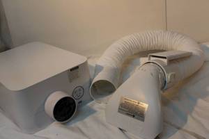 lot 123 image: BedJet Machine with Remote