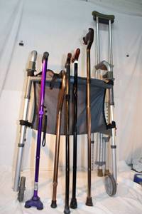 lot 128 image: Variety of Walking Aides, Canes, Crutches and Walker