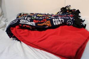 lot 188 image: NFL Teams blanket and Tommy Hilfiger red blanket