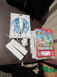 lot 15 image: Wii games, and 2 controllers