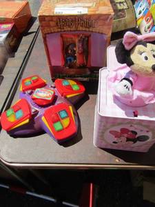lot 16 image: Minnie Mouse jack n the box, Harry potter figurine, Blitzo uno game