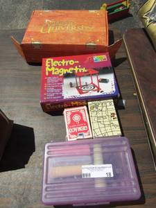 lot 18 image: 2 sets of playing cards, electro- magnetic game, pencil box of used chalk and more