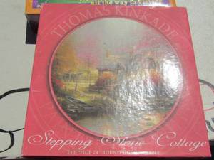 lot 23 image: New puzzles qty 2 by Thomas Kinkade,   & Mexican train game