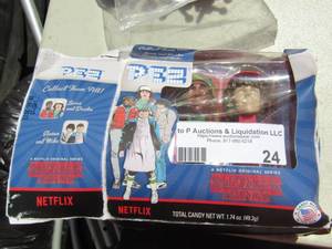 lot 24 image: Jacks game in ziploc bag, larger size jacks, Pez candies Stranger things missing 1