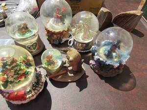 lot 30 image: 6 various kinds of snow globes, includes bears- Christmas, dolphins and more, some don�t have water inside