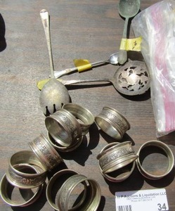 lot 34 image: Silver plate lot includes, napkin holders, serving utensils qty 3