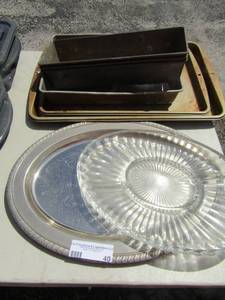 lot 40 image: Variois baking sheets and bread pans, silver plate platter, divided glass server