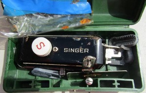 lot 52 image: Singer Button machine hand held # W-654321-N in box, Bag of various yarn with kroshea needles
