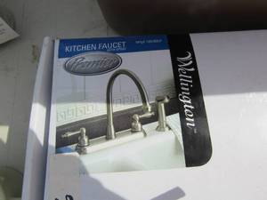 lot 63 image: New kitchen faucet with sprayer