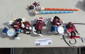 lot 68 image: Raisens figurines and un used pencils with spinning tops