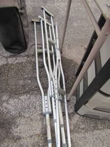 lot 104 image: 2 sets of used adult crutches with adjustable height