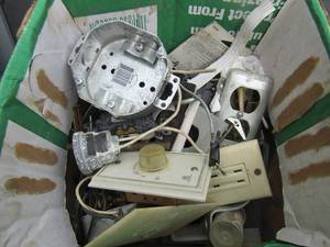 lot 109 image: Box full of electrical outlet boxes and plugs, some new and some used