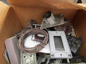 lot 115 image: Small box of electrical plus, wire, wall brackets and more