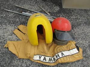 lot 122 image: VINTAGE Yamaha size small motorcycle pants, motorcycle hat used, and more