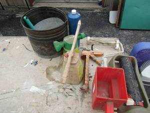 lot 124 image: Hand held yard seed spreaders, caulking guns, paint rollers and much more
