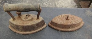 lot 137 image: 2 cast-iron irons one is missing the handle qty 2