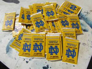 lot 151 image: University of Norte Dame trading cards 1st edition  APPROX 25 PAKS  UNOPENED