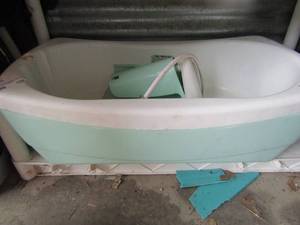 lot 159 image: used baby bath tub has shower head needs cleaned