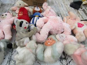lot 162 image: blue tote full of stuffed animals like bunnies, bears, gorilla and more