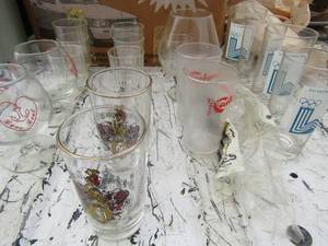 lot 169 image: various glass lot and plastic cups, short stem wine glasses, tea glasses, and more
