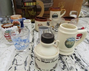 lot 170 image: Sooner Oklahoma beer mug , various state shot glasses