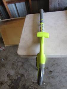 lot 16 image: Ryobi 10 cut battery operated weed eater, uses 18 volt battery, not included