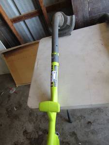 lot 17 image: Ryobi 10 cut battery operated weed eater, uses 18 volt battery, not included