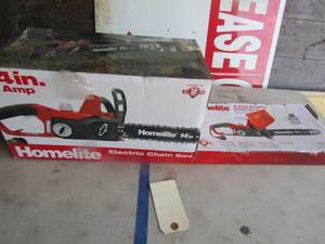 lot 36 image: Homelite 14 9amp electric chainsaw, in origina box