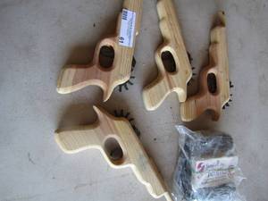 lot 61 image: 3 hand made wooden rubber band guns qty 3 plus 2 bags of new rubber bands