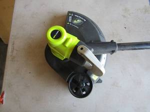 lot 65 image: Ryobi 11thru 13cut battery operated weed eater, 18 volt
