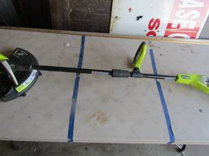 lot 68 image: Ryobi 11thru 13cut battery operated weed eater, 18 volt
