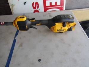 lot 81 image: Dewalt 60 volt brushless weed eater