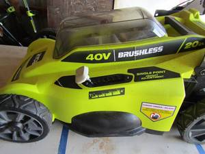 lot 85 image: Ryobi 20 cut 40 volt lawn mower unknown working condition