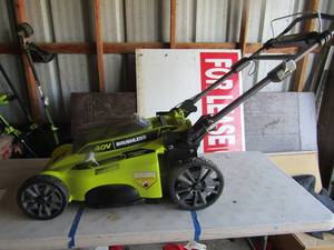 lot 88 image: Ryobi 20 cut 40 volt lawn mower unknown working condition